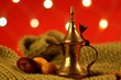 golden arabic tea pot with dates