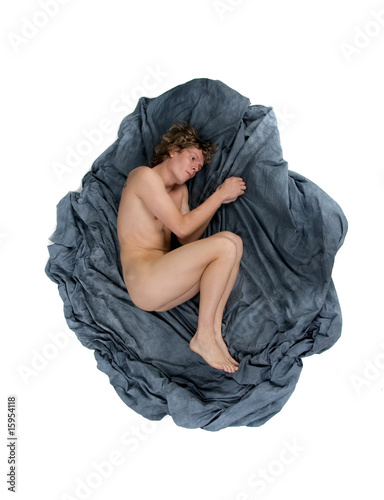 Photo: Nude person in a fetal position Nude person in a fetal position