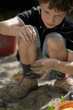 Kleiner Junge spielt im Sand Kleiner Junge spielt im Sand