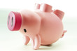 Pink piggybank, upside down