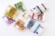 Bundle of euro banknotes, overhead view