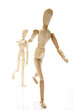 Two walking figurines