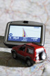 Navigation instrument and motorcar on a map