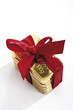 Gold bars with red bow