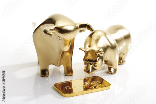 Photo: Bull and bear sculptures by gold bar Bull and bear sculptures by gold bar