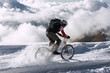 Spain, Sierra Nevada, mountainbiking across snow