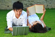 Couple Reading Books In The Park Couple Reading Books In The Park