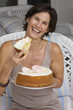 Woman holding a cake