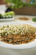 Close-up of bean sprouts with cereals on a plate