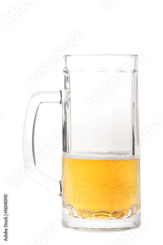 Photo: Half-drank beer mug isolated on white Half-drank beer mug isolated on white