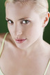 A portrait of a young blonde woman