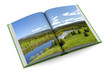 Opening book on white background. 3D image