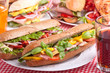big group of sandwiches on a table
