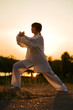 Foto: woman in white suit make's taiji chuan exercise - 8 woman in white suit make's taiji chuan exercise - 8