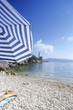 Foto: Croatia, Dubrovnik, woman lying on towel at beach, low section Croatia, Dubrovnik, woman lying on towel at beach, low section
