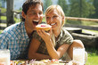 Austria, Salzburger Land, couple having breakfast
