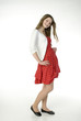 Brunette girl (13-14) in red dress, portrait