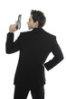 Young man holding hand gun, close-up