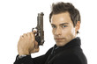 Young man holding hand gun, close-up