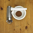 Nutmeg with mortar and grater, close-up