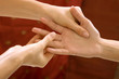 Woman receiving hand massage