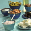 Greek starters, feta cheese, taramas, tsatsiki and pickled vegetables