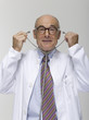 Portrait of a senior male doctor, holding stethoscope