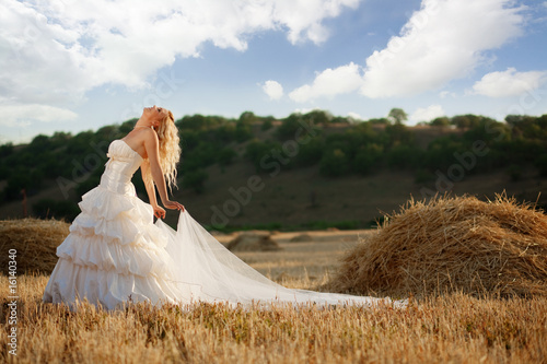 Photo: Bride in autumn field Bride in autumn field