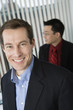 Foto: Portrait of a mid adult man smiling. Portrait of a mid adult man smiling.