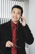Photo: Portrait of a businessman using a mobile phone. Portrait of a businessman using a mobile phone.