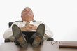 Business leader relaxing at his desk