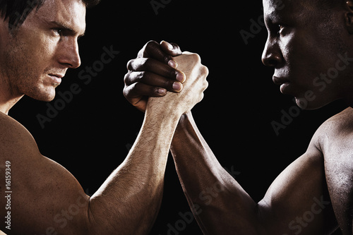 Photo: Two men arm wrestling Two men arm wrestling
