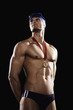 Swimmer with gold medal wearing cap and goggles