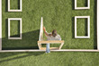 Man walking through door in house outline