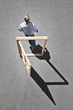 Man walking through door frame
