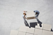 Couple organizing boxes
