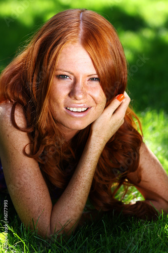 Photo: Portrait of the beautiful red-haired girl Portrait of the beautiful red-haired girl