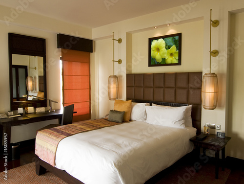 Photo: Thai style tropical hotel bedroom Thai style tropical hotel bedroom
