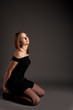 Photo: dreaming young woman in black evening dress separated dreaming young woman in black evening dress separated