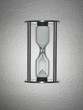 Hourglass draining sand