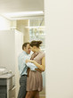 Businesspeople dancing in copy room