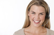 Woman With Headset Smiling at Camera Woman With Headset Smiling at Camera
