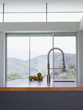 Interior of modern kitchen with spray nozzle