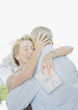 Man giving wife anniversary gift