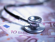 Close up of stethoscope on 10 euro notes
