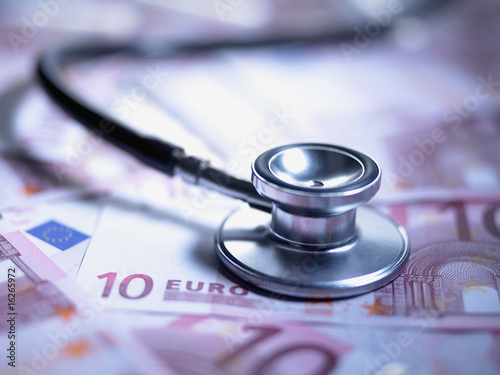 Photo: Close up of stethoscope on 10 euro notes Close up of stethoscope on 10 euro notes