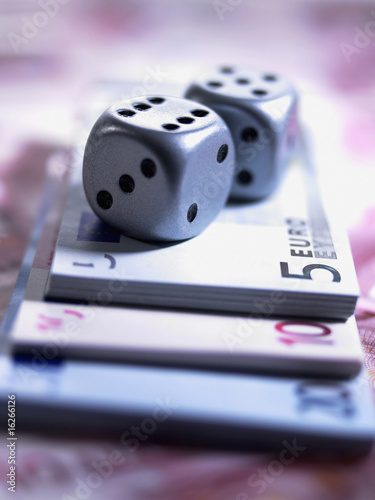 Photo: Close up of dice and euro notes Close up of dice and euro notes