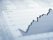 Ascending line graph and list of share prices