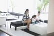 Mother playing backgammon with children