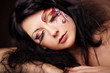 Long lashes and face-art